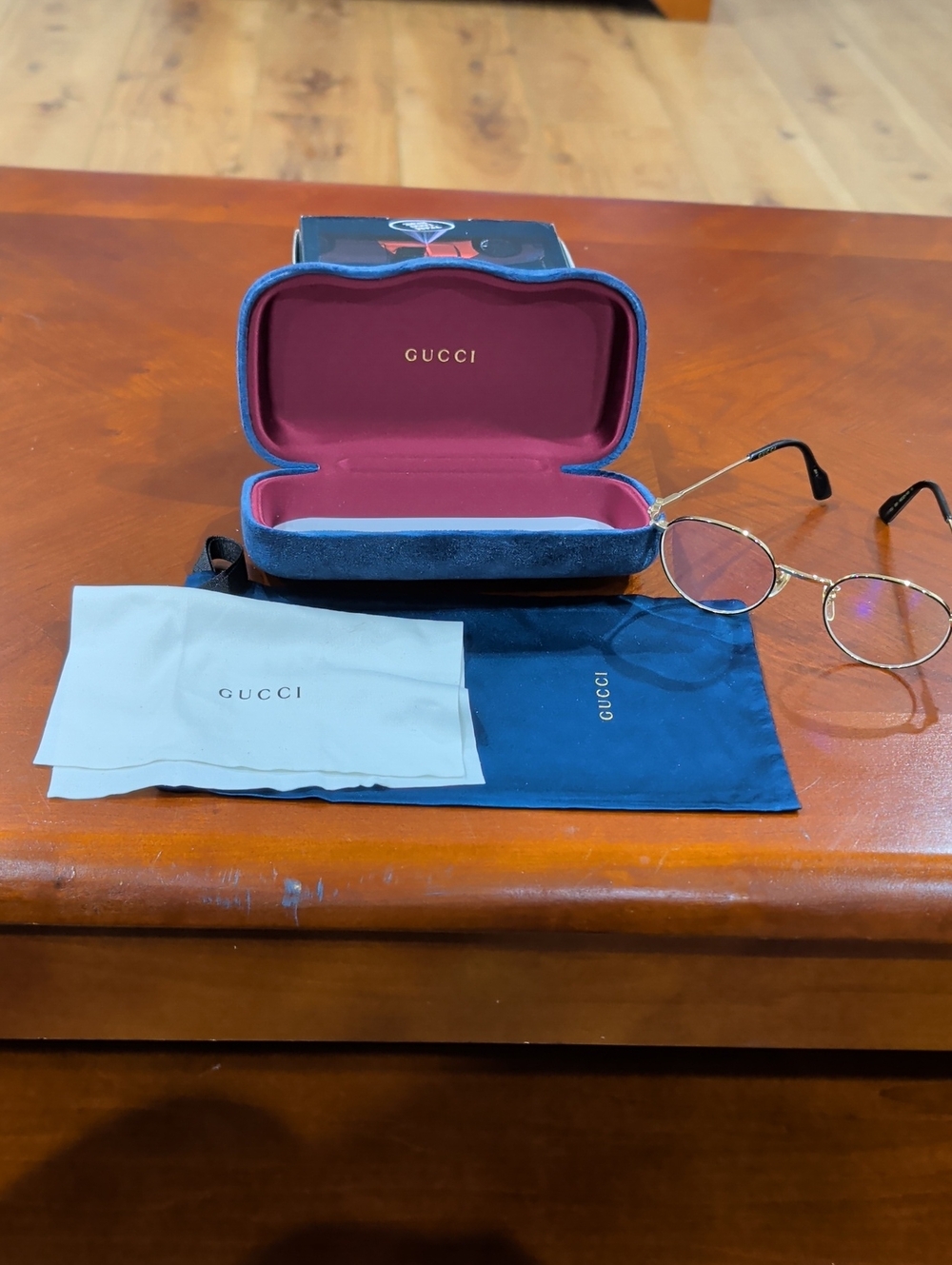 Gucci Women's Gold Metal Frame Eyeglasses with Blue Case